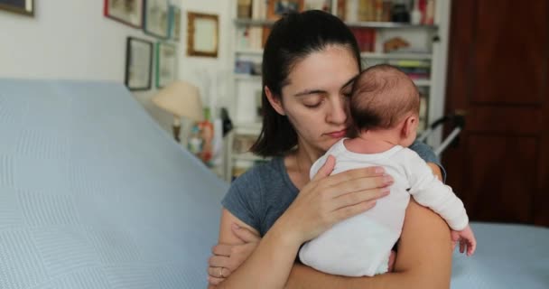 Mom Tapping Newborn Baby Back Helping Hiccups — Stockvideo