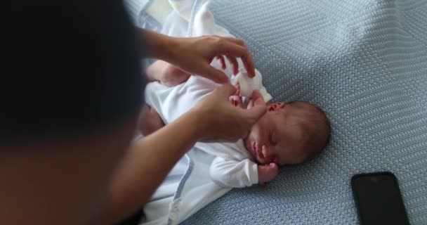 Newborn Baby Taking Nap Mother Adjusting Clothes — Vídeo de Stock