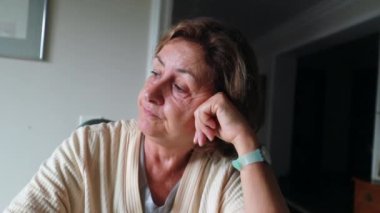 Older woman thinking about life authentic real life contemplative senior lady