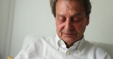 Older man using cellphone device