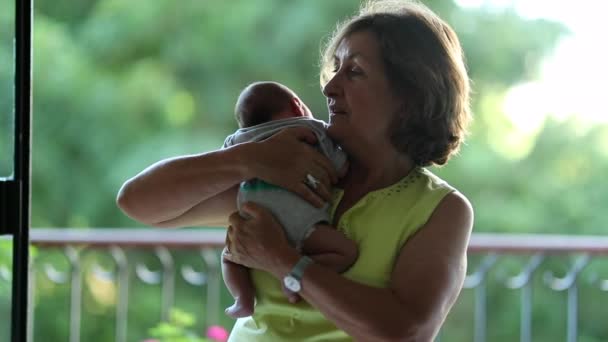 Candid Grand Mother Holding Baby Grand Son Outdoors — Vídeo de Stock