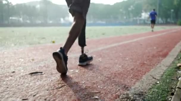 Disabled Athlete Prosthetic Leg Running Slow Motion Determination Concept — Stock Video