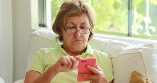 Senior Older Woman Holding Smartphone Device Pressing Screen Finger — Stok video