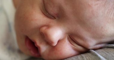 Portrait of newborn baby face sleeping