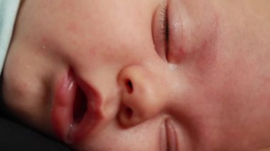 Macro closeup of baby infant sleeping