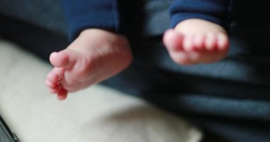 Cute baby newborn chubby feet closeup