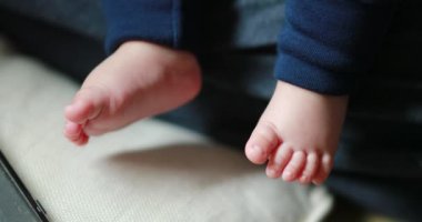Adorable newborn baby chubby feet