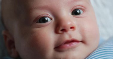 Baby newborn face closeup expression detail macro