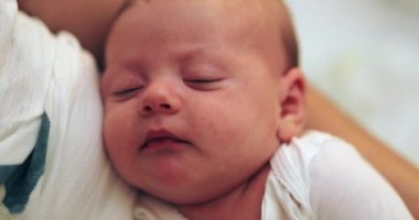 Portrait of newborn baby face asleep