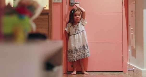 Small Child Holding Entrance Door Knob — Stock Video