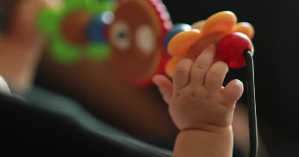 Closeup Infant Baby Hands Playing Spinning Toy — Vídeos de Stock