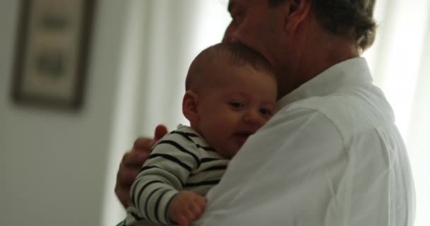 Authentic Grandfather Holding Baby Infant Toddler Home — Stockvideo