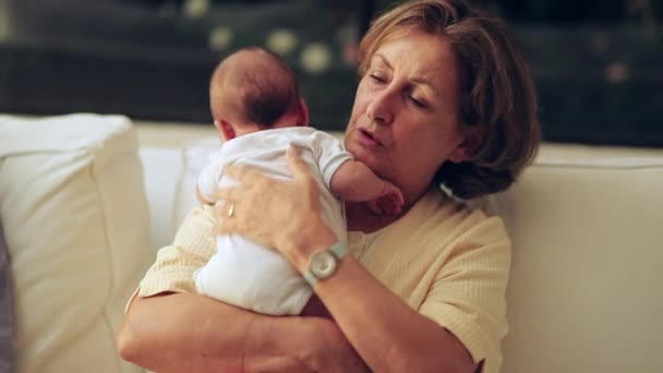 Casual Candid Grandmother Holding Newborn Baby Grandson — Stock Video