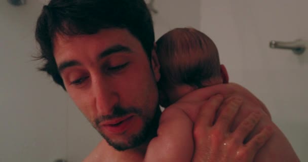 Father Holding Baby Son Shower Candid Authentic — Vídeo de stock