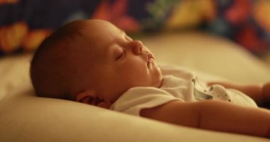 Baby newborn sleeping at night in bedtime