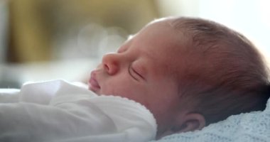 Beautiful newborn baby infant face sleeping