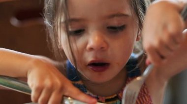 Little girl child at lunch table
