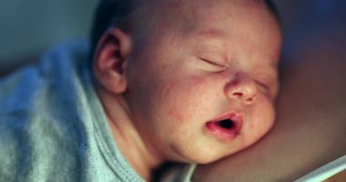Closeup newborn baby face sleeping