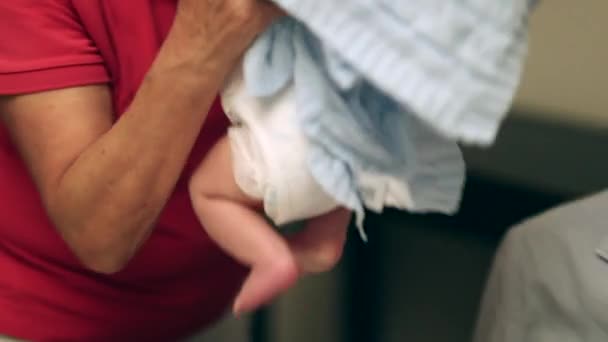 Grand Mother Lifting Newborn Baby Calming – stockvideo
