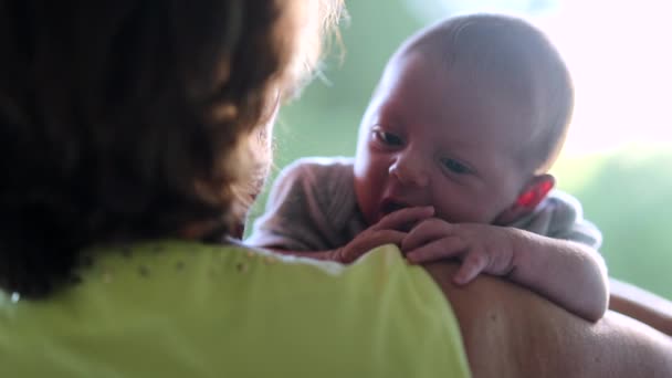 Grandma Holding Newborn Baby Infant Arms Outdoors — Stock video