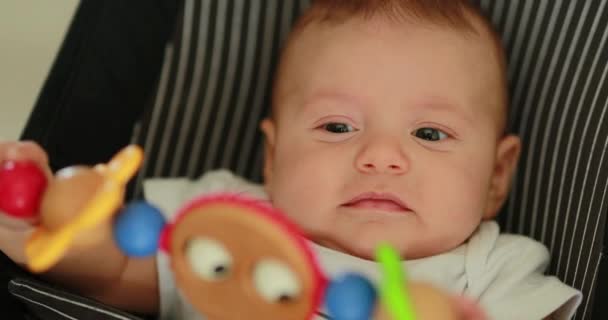 Baby Newborn Chair Seated Spinning Toy Foreground — Video