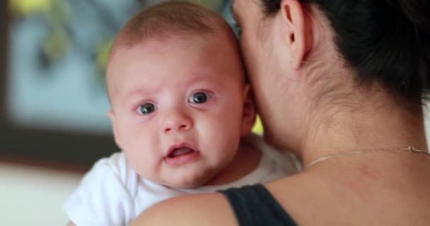 Mother Holding Calming Crying Baby Looking Camera — Vídeo de stock