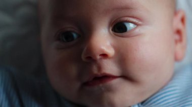 Cute baby closeup face expression feeling joy