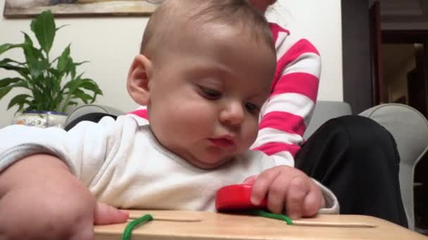 Baby Playing Toys Indoors — Vídeo de stock