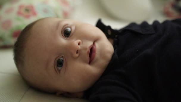 Baby Boy Layed Bed Looking Camera Feeling Happy — Stock videók