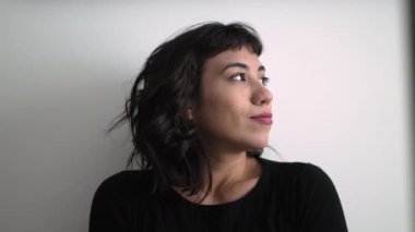 One happy delighted female hispanic young woman smiling. Portrait face closeup of positive latin girl