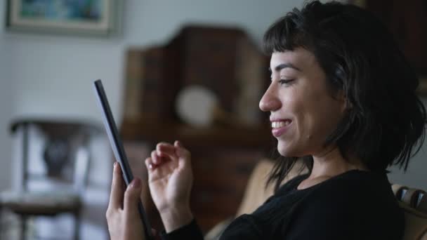 Latin Woman Liking Content Online Person Cheering Success Holding Tablet — Stockvideo