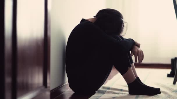Fearful Depressed Person Sitting Floor Covering Face Fetal Position Desperate — Video
