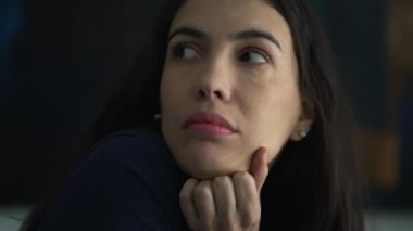 Thoughtful woman in 30s thinking in dilemma. Pensive person pondering decision