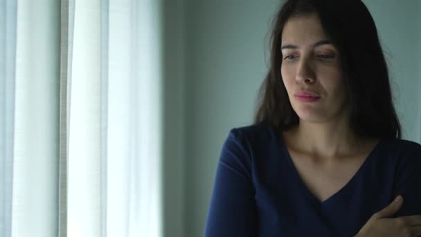 Preoccupied Woman Standing Window Feeling Anxiety — стоковое видео