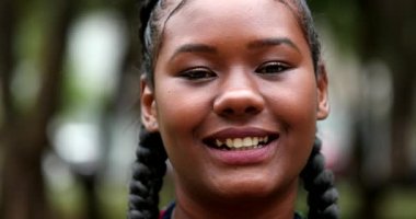 Young black woman smile outside