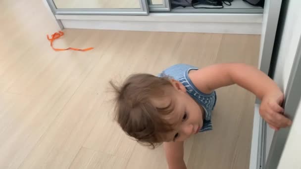Baby Opening Closet Infant Toddler Boy Opens Closet Armoir Wardrobe — Vídeo de Stock