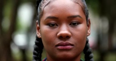 African girl becoming serious. Upset black woman
