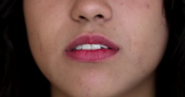 Upset hispanic girl changing emotion. Woman lips mouth becoming angry