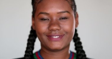 Casual African girl smile. Young woman portrait face