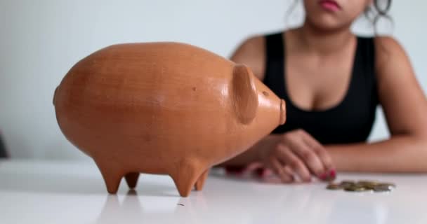 Girl Hands Inserting Money Piggy Bank — ストック動画