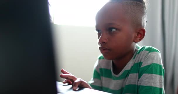 African Boy Studying Home Front Laptop Computer — Stockvideo