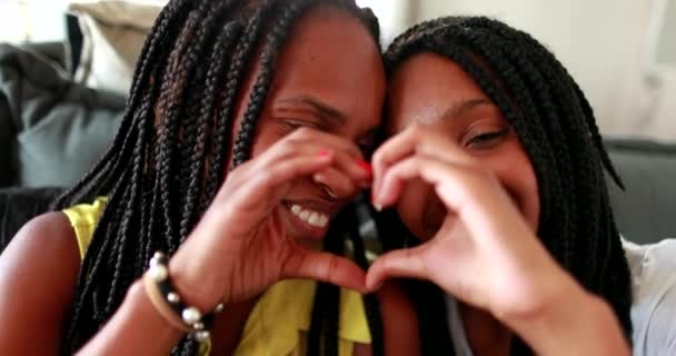 Mixed Race Mother Teen Daughter Making Heart Symbol Hands — Vídeo de stock