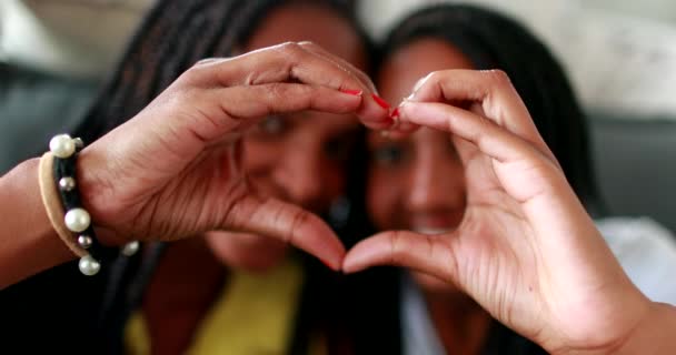 Mixed Race Mother Teen Daughter Making Heart Symbol Hands — Vídeos de Stock