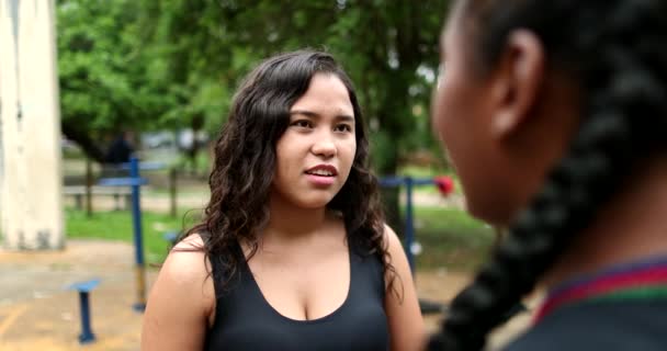 Two Friends Conversation Outdoors Interracial Friendship African Hispanic Latin Girlfriends — Vídeo de Stock