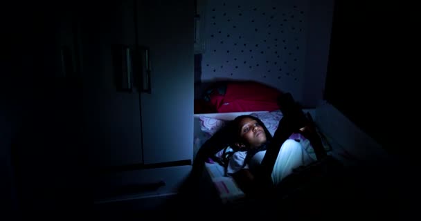 Teen Black Girl Using Cellphone Device Night Bed — Stockvideo