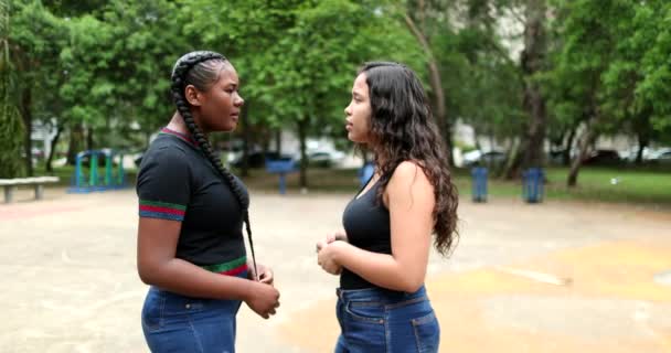 Two Friends Conversation Outdoors Interracial Friendship African Hispanic Latin Girlfriends — ストック動画