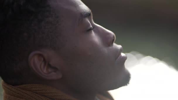 Black Man Taking Deep Breath Opening Eyes Looking Sky Smiling — Video
