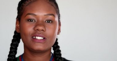 African girl speaking in video conference. Black girl giving testimony to camera