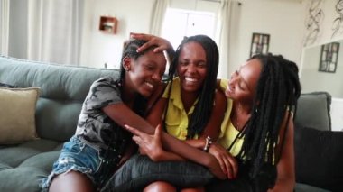 Black African american family. Mother and teenage daughters together