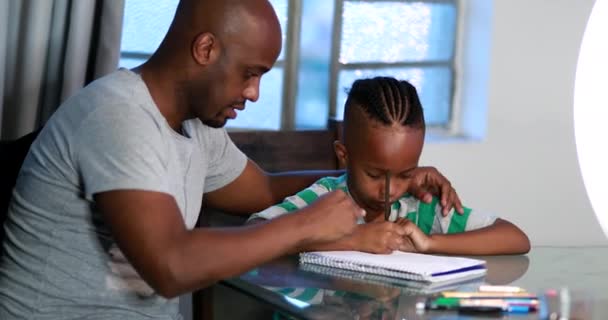 Father Mentoring Son Dad Helping Kid Homework Study — Vídeo de stock